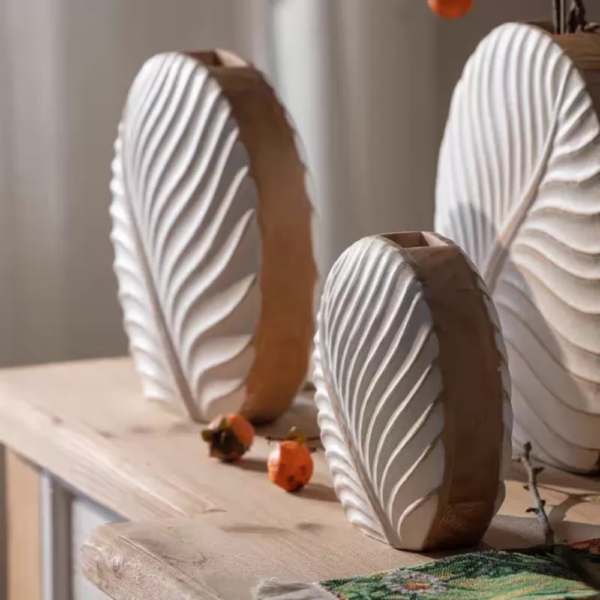 فازات خشبية ديكورية بثلاثة أحجام بتصميم متموج عصري
